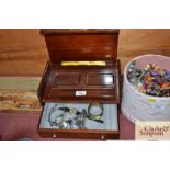 A folding mahogany jewellery box and contents of v