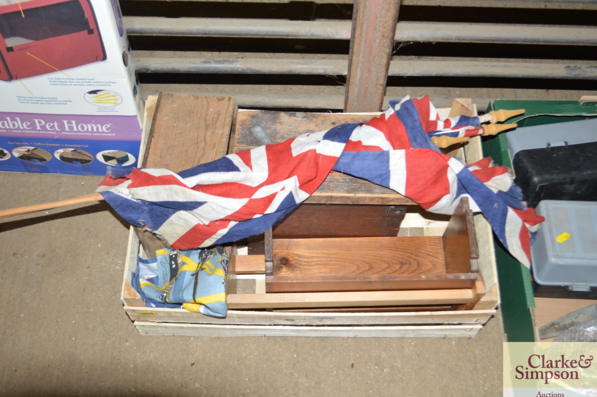 A box containing vintage flags, stool and wooden b