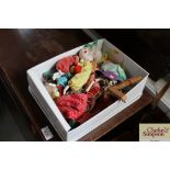 A box containing various Pelham puppets, mostly in