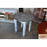 A round slate topped conservatory table AF