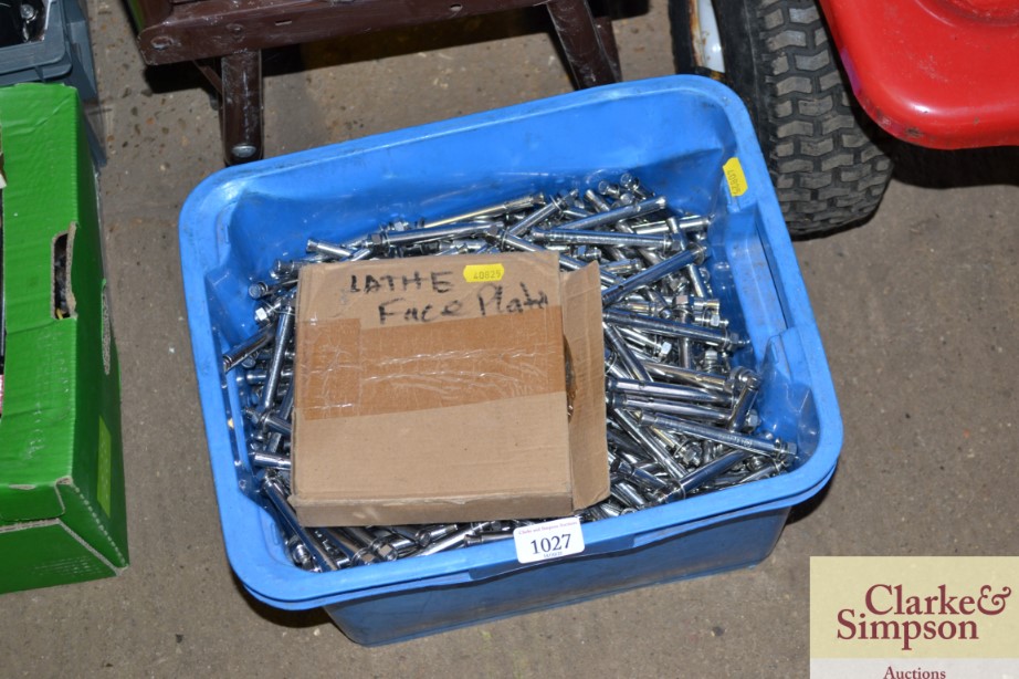 A box containing a lathe face plate and box of var