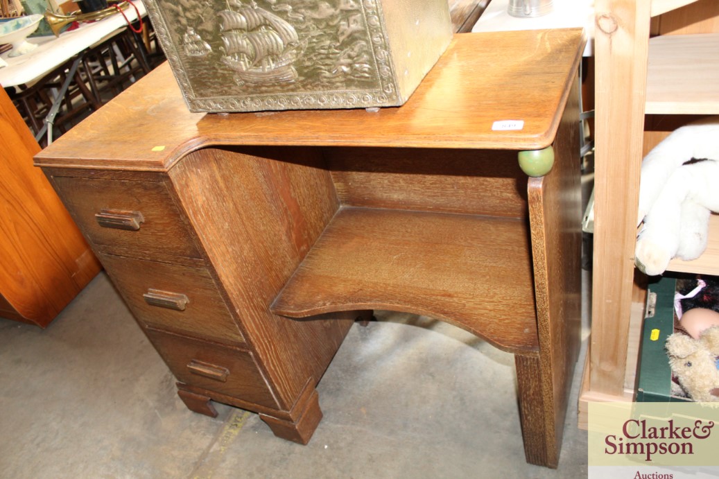 An Art Deco desk fitted with three drawers