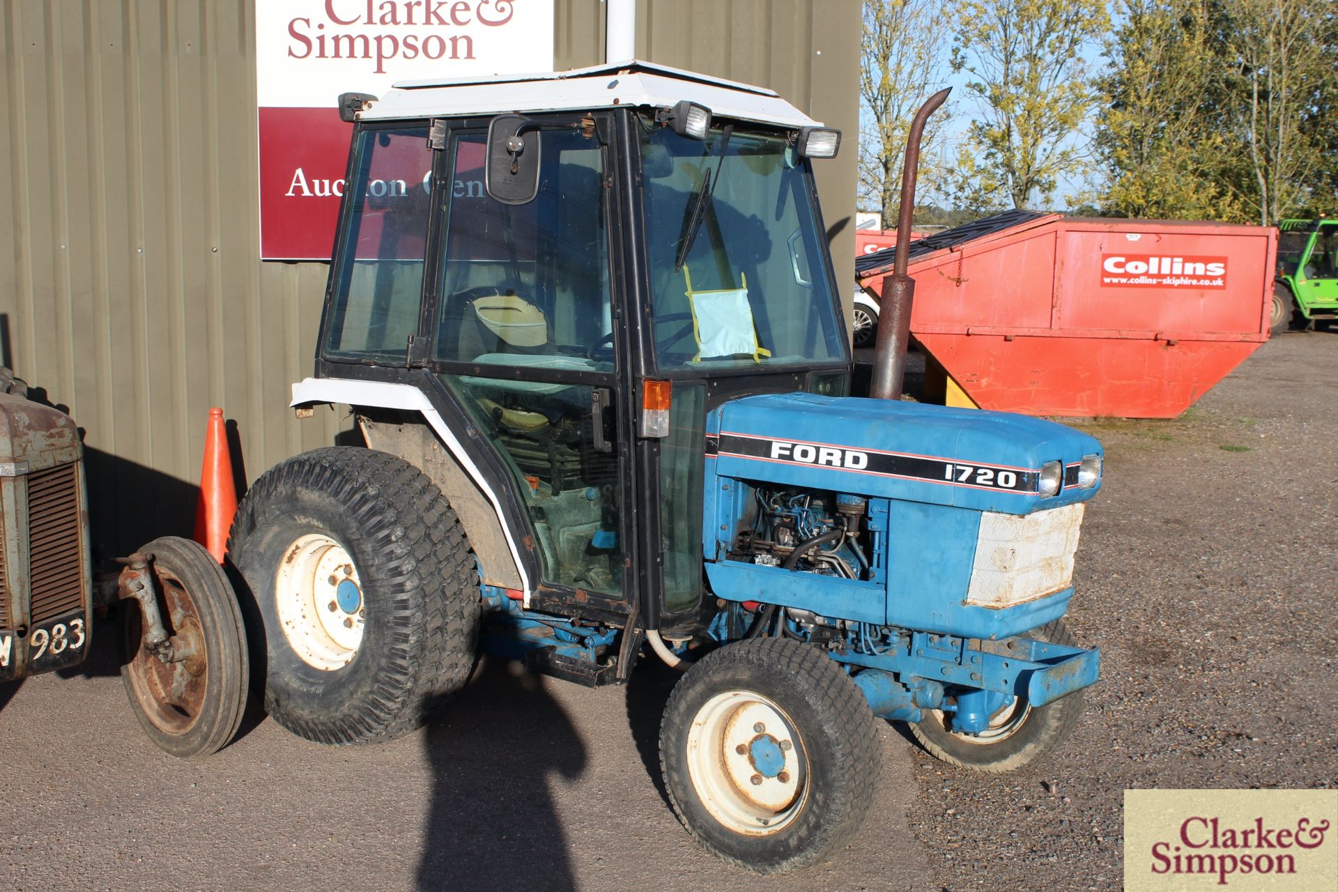 Ford 1720 4WD compact tractor. 4,685 hours. Turf wheels and tyres all round. Cab.