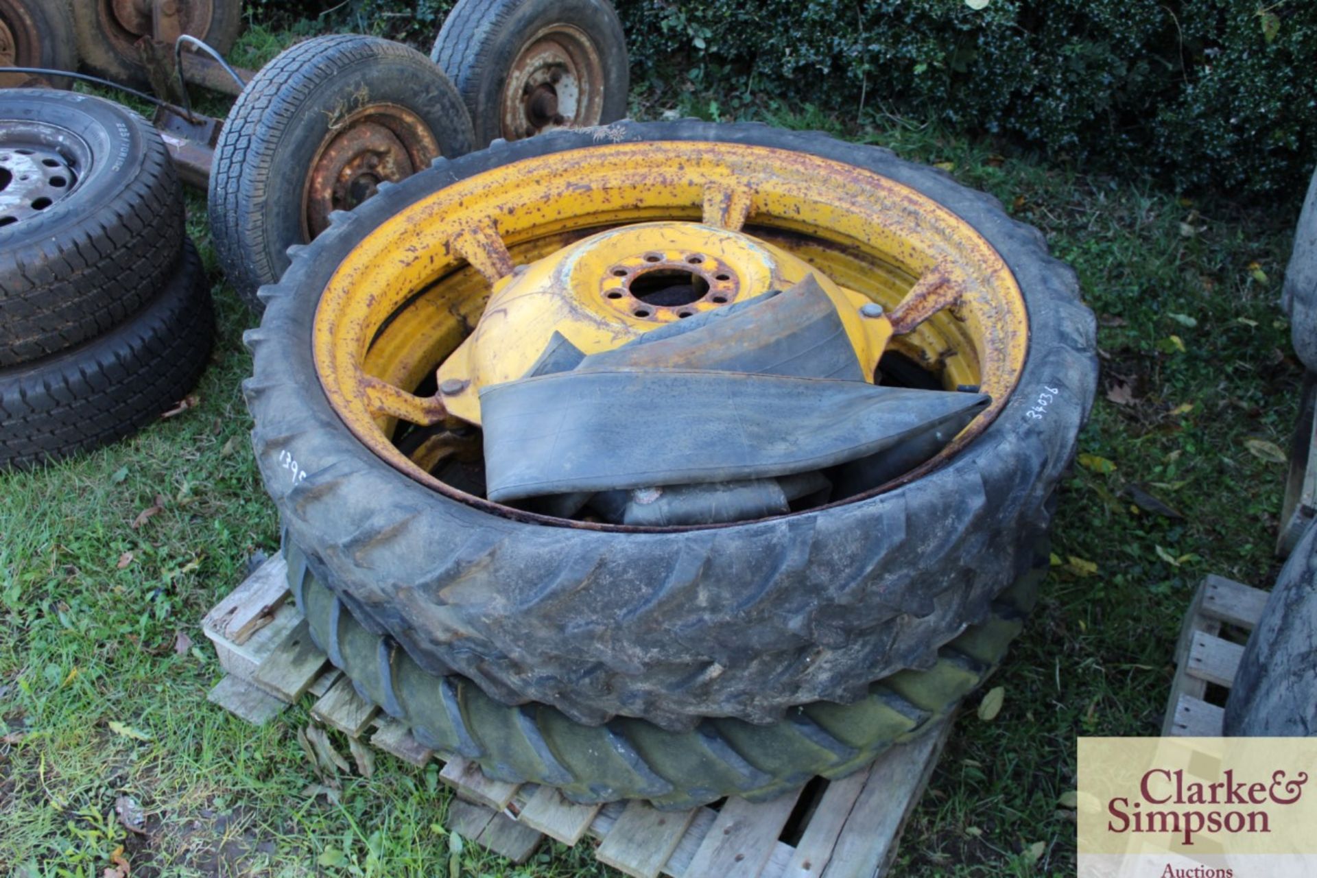2x rowcrop wheels and tyres to fit Ferguson tractor and an additional tyre.