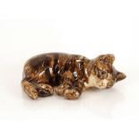 Winstanley Pottery figure of a recumbent cat, mark