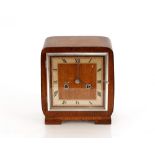 An Art Deco oak eight day mantel clock