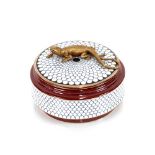 A bronze and porcelain circular box with lizard de