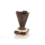 A cast metal and marble Art Deco vase, of tapering