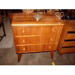 A Cumbrae by Morris of Glasgow mid 20th Century walnut chest of three long drawers, raised on square