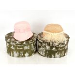 Two Harrods vintage hat boxes with a Shaun Barrett