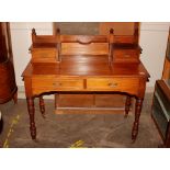 An early 20th Century mahogany writing desk by Sho