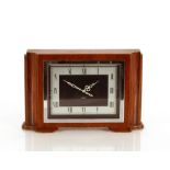 An Art Deco walnut cased Smiths mantel clock, 28cm