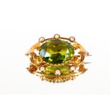 An oval 9ct gold seed pearl and green stone se