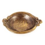 A bronze twin handled bowl, from Willie Steinlin'