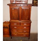 A Padauk wood Arts & Crafts design cabinet on ches