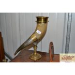 A horn and brass mounted libation cup