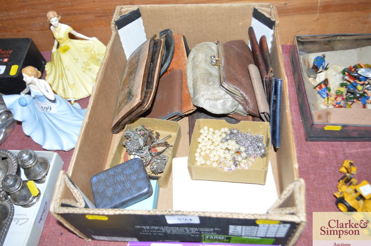 A box of various wallets; purses and costume jewel