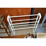A white painted towel rail