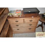 An Edwardian satin wood walnut chest fitted two sh