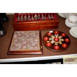 A Victorian beadwork table stand and a games board