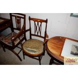 An Edwardian mahogany and satinwood inlaid salon e