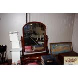 A Victorian mahogany swing framed toilet mirror