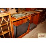 Four teak open fronted bookcases