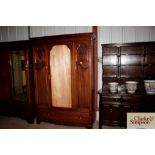 An Edwardian mahogany wardrobe (mirror missing)