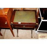 A mahogany drop leaf coffee table