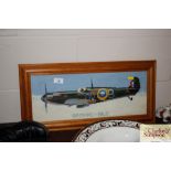 An embroidery of a Spitfire in pine frame