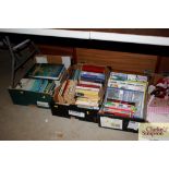 Three boxes of miscellaneous books`