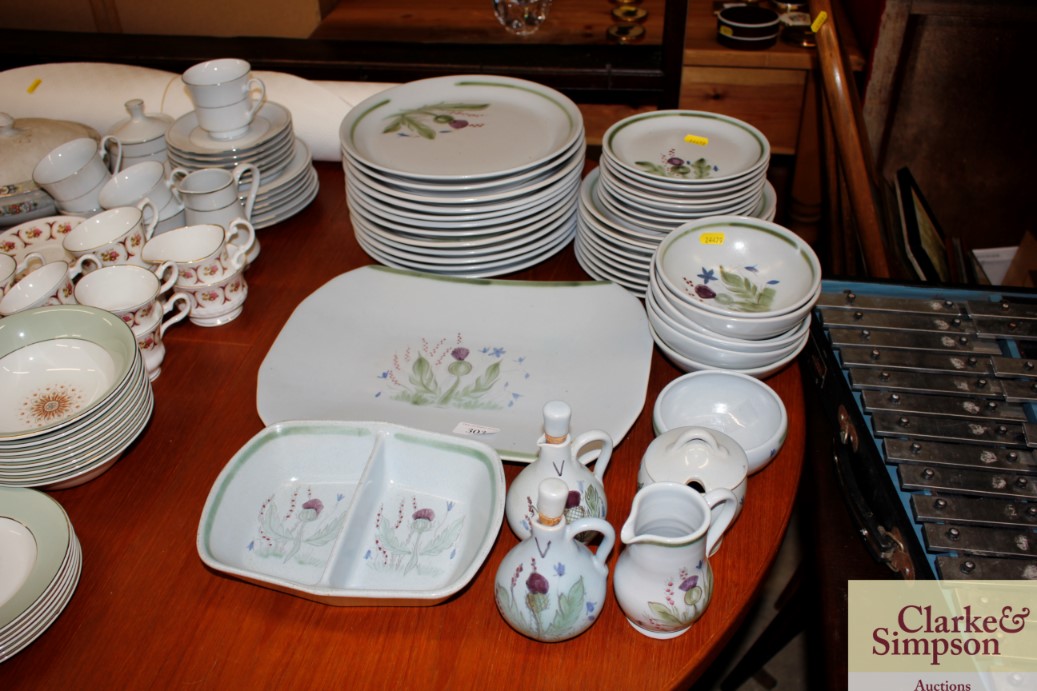 A quantity of Forest Stoneware dinnerware