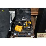 A Dewalt cordless drill and charger in fitted case