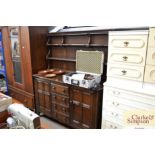 An Ercol style dresser fitted four central drawers