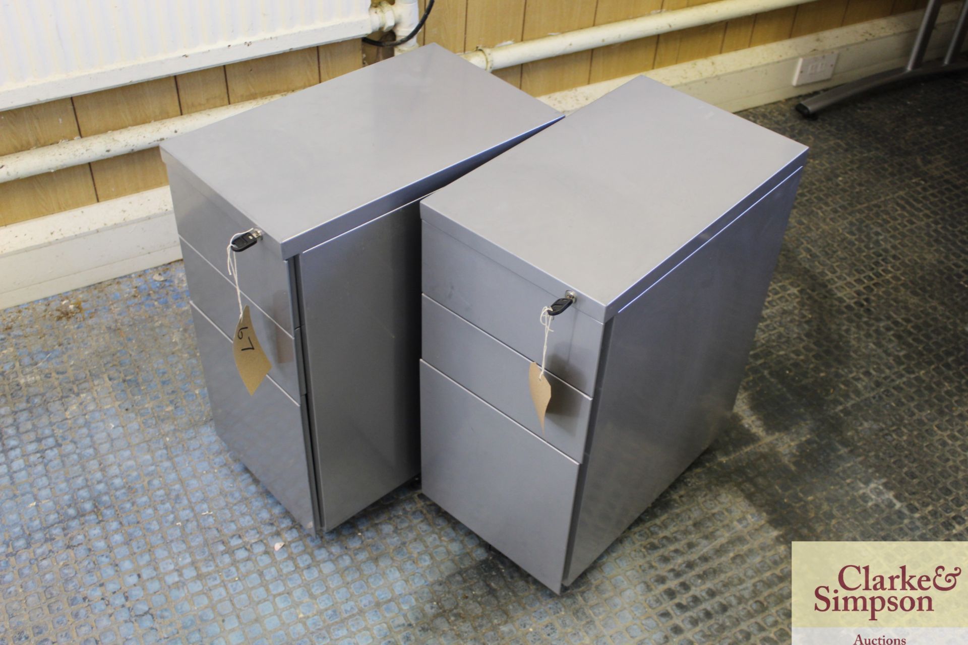 2x grey metal 3 drawer desk pedestals. With keys.