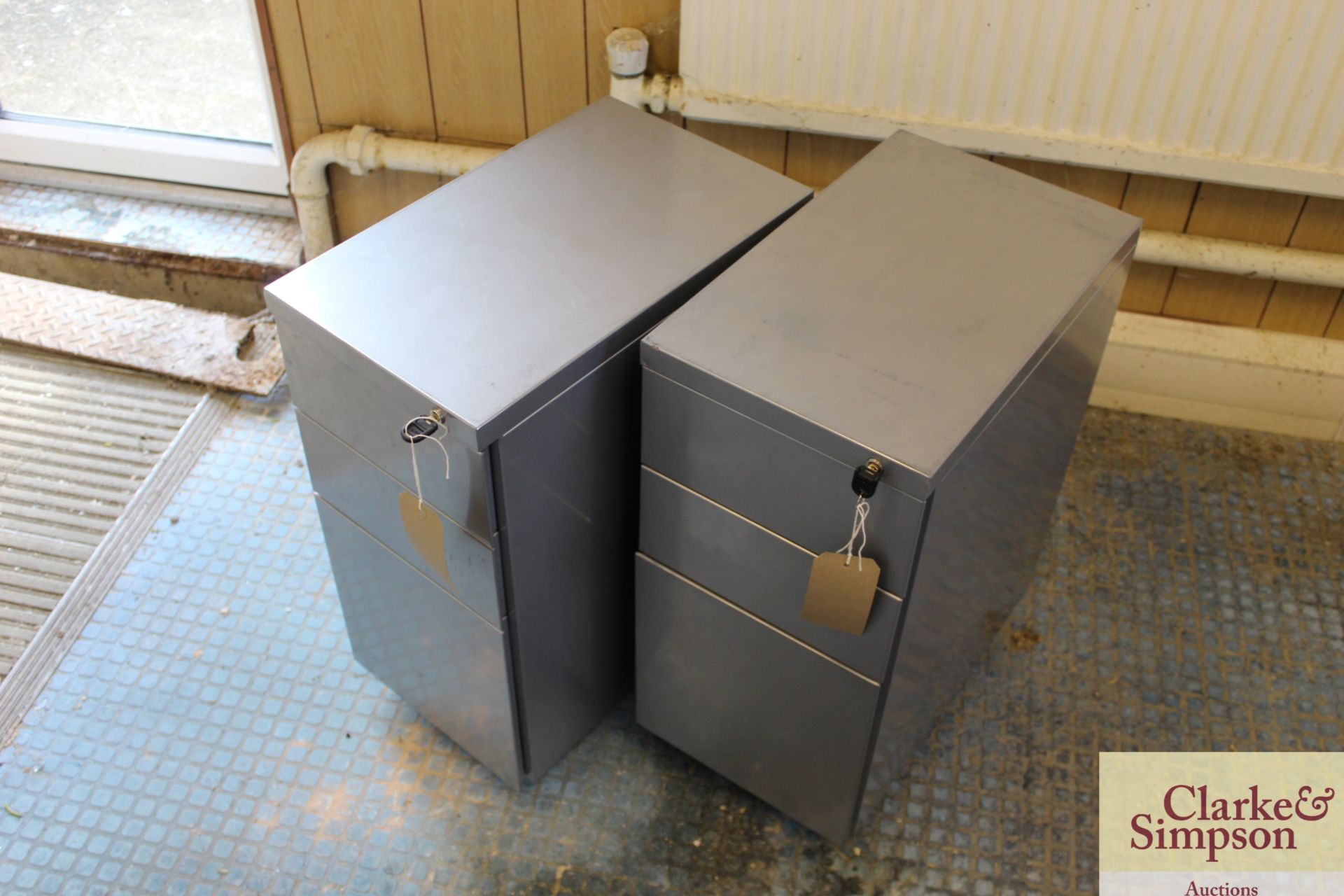 2x grey metal 3 drawer desk pedestals. With keys.
