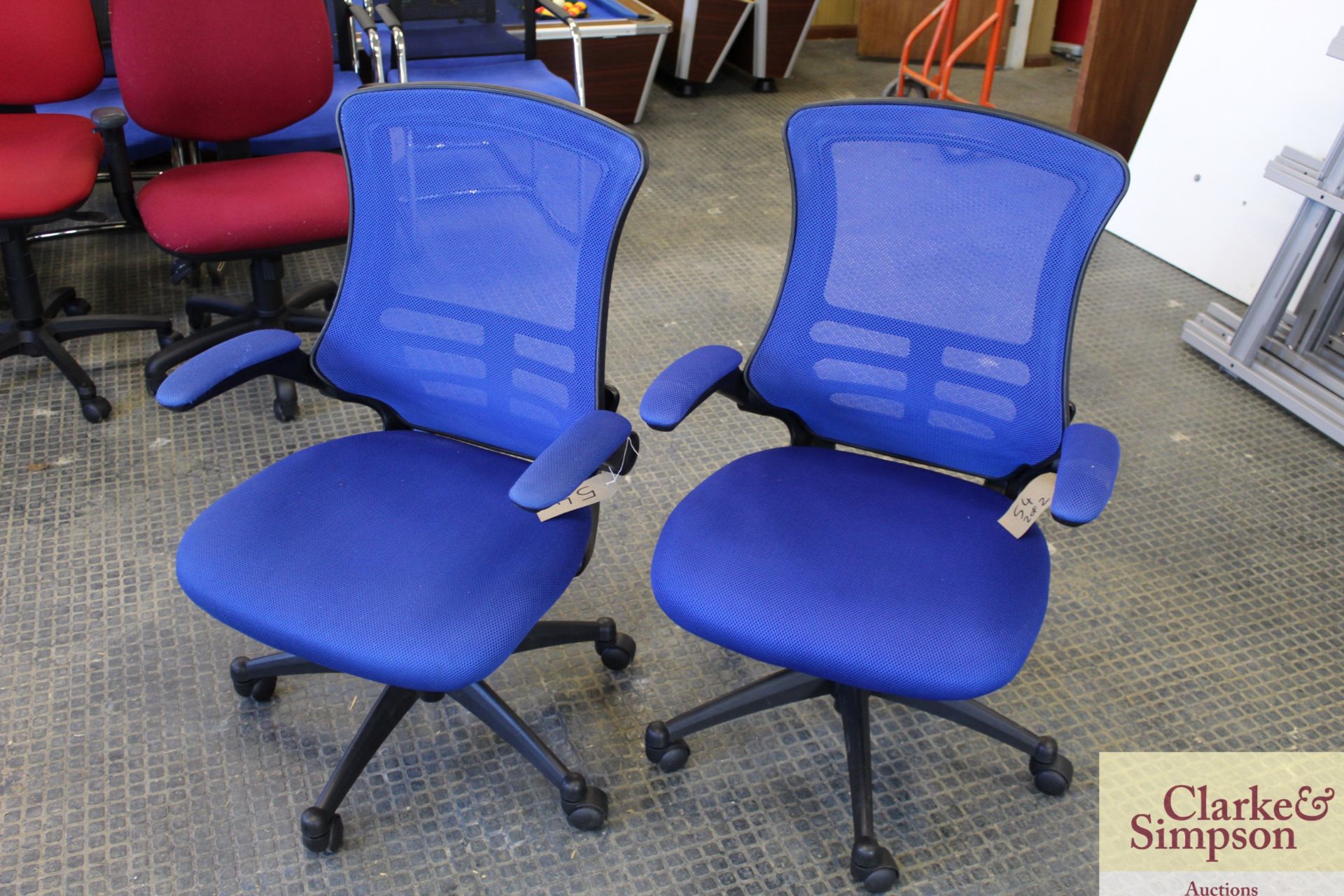 2x blue office chairs.