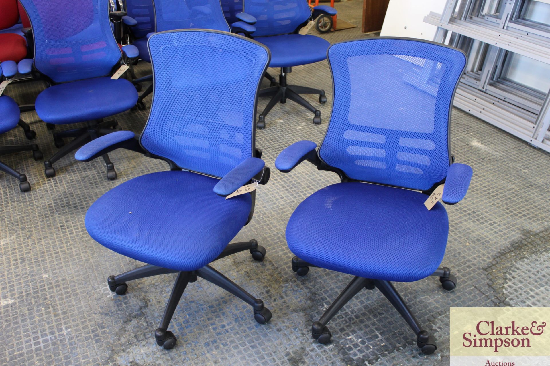 2x blue office chairs.