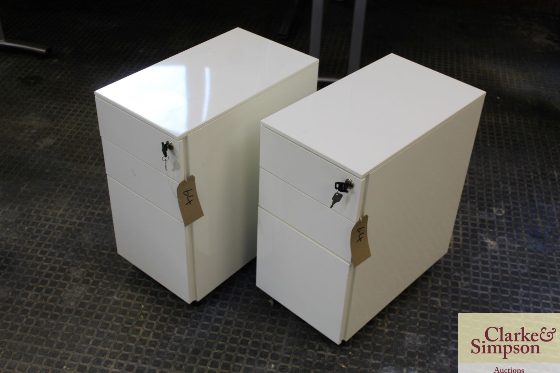 2x white metal 3 drawer desk pedestals. With keys.