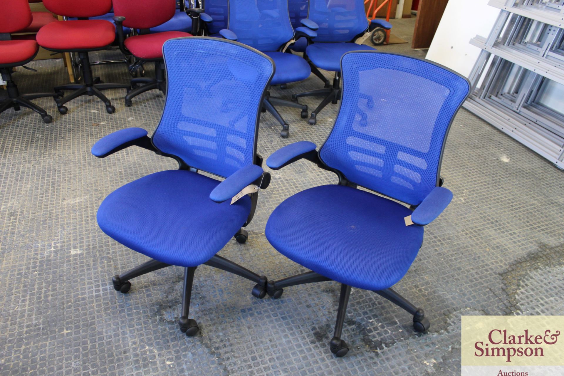 2x blue office chairs.