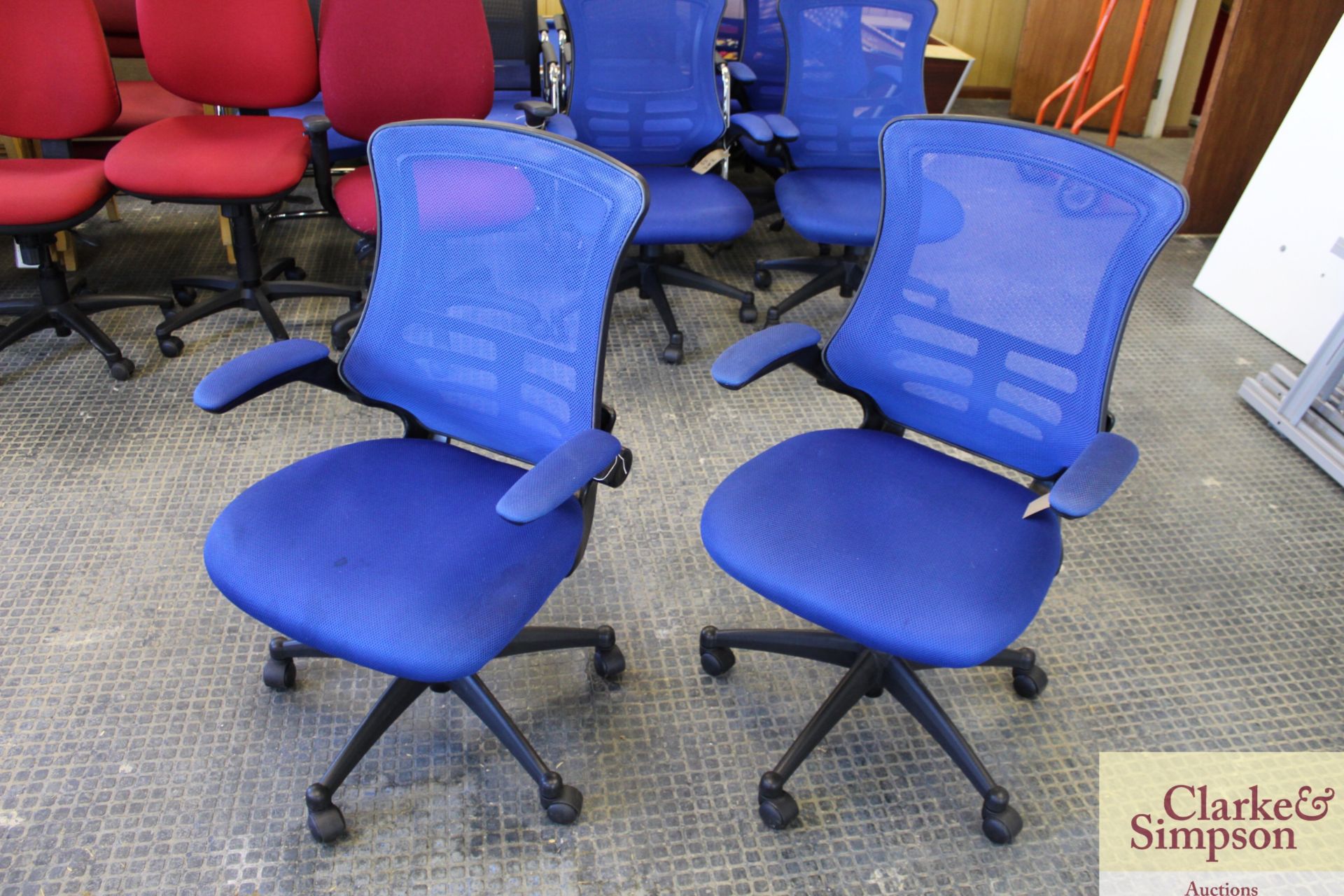 2x blue office chairs.