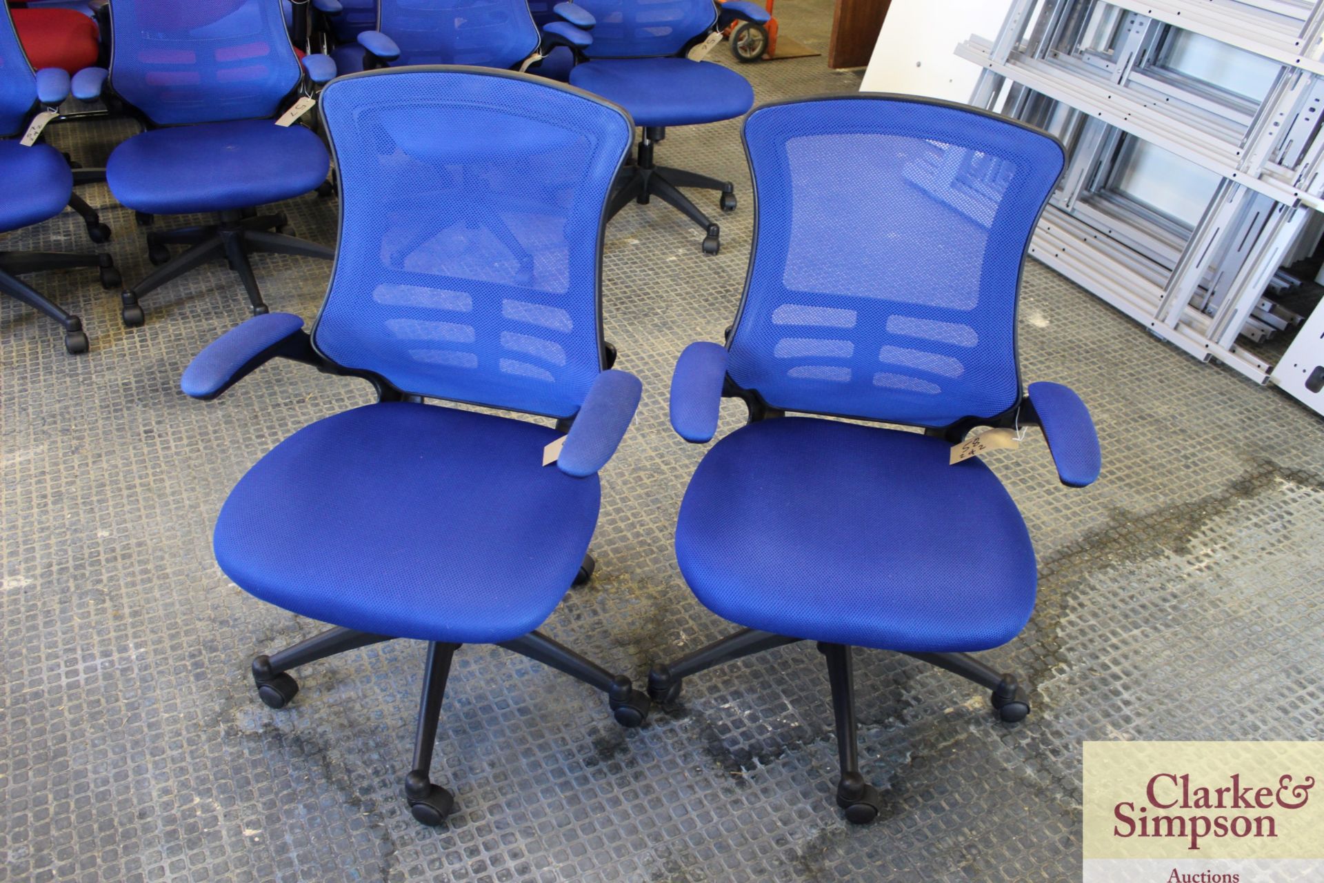 2x blue office chairs.