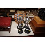A quantity of Bowls Club trophies