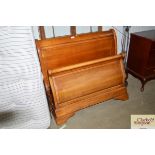 A single sleigh bed and mattress