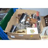A box containing various stainless steel kitchenal
