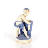 A Parian ware posy vase, in the form of a fisher boy carrying a basket, 20cm high