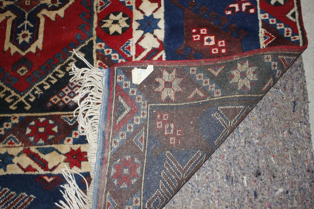 A Dosnealti carpet, South West Turkey, the red field with overall column of hooked and stepped - Image 15 of 15