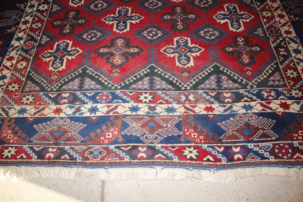 A Dosnealti carpet, South West Turkey, the red field with overall column of hooked and stepped - Image 10 of 15