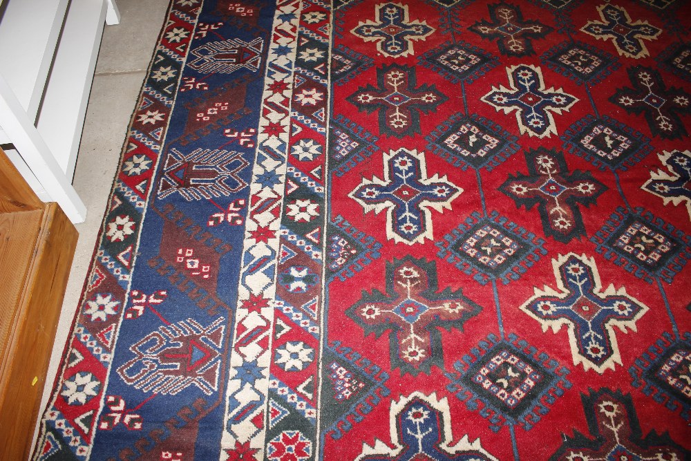 A Dosnealti carpet, South West Turkey, the red field with overall column of hooked and stepped - Image 13 of 15