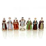 A Sitzendorf group of King Henry VIII, and his six wives, 20cm high